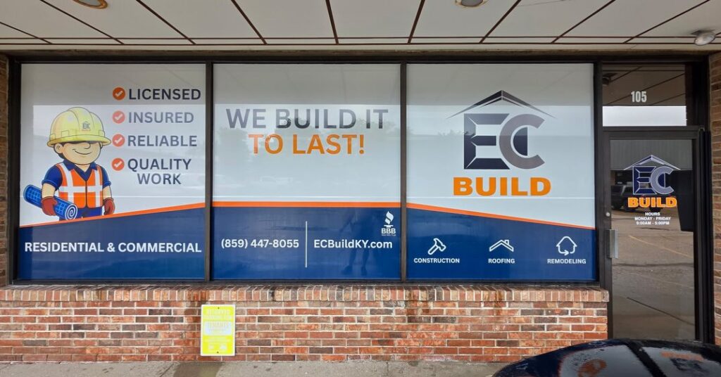 Custom storefront window graphics and vinyl decals for EC Build in Lexington, Kentucky featuring business branding, contact information, and construction services.