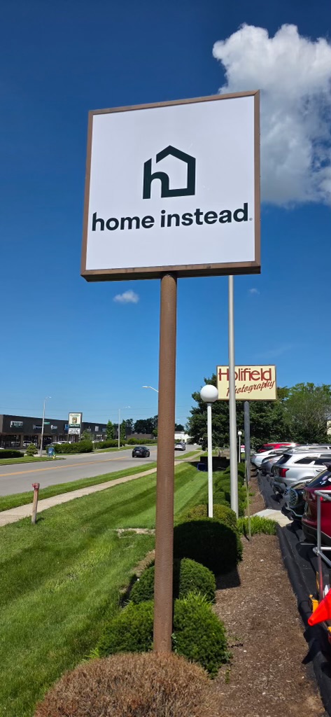 Custom pylon sign for Home Instead installed by The Sign Shop in Lexington, Kentucky.