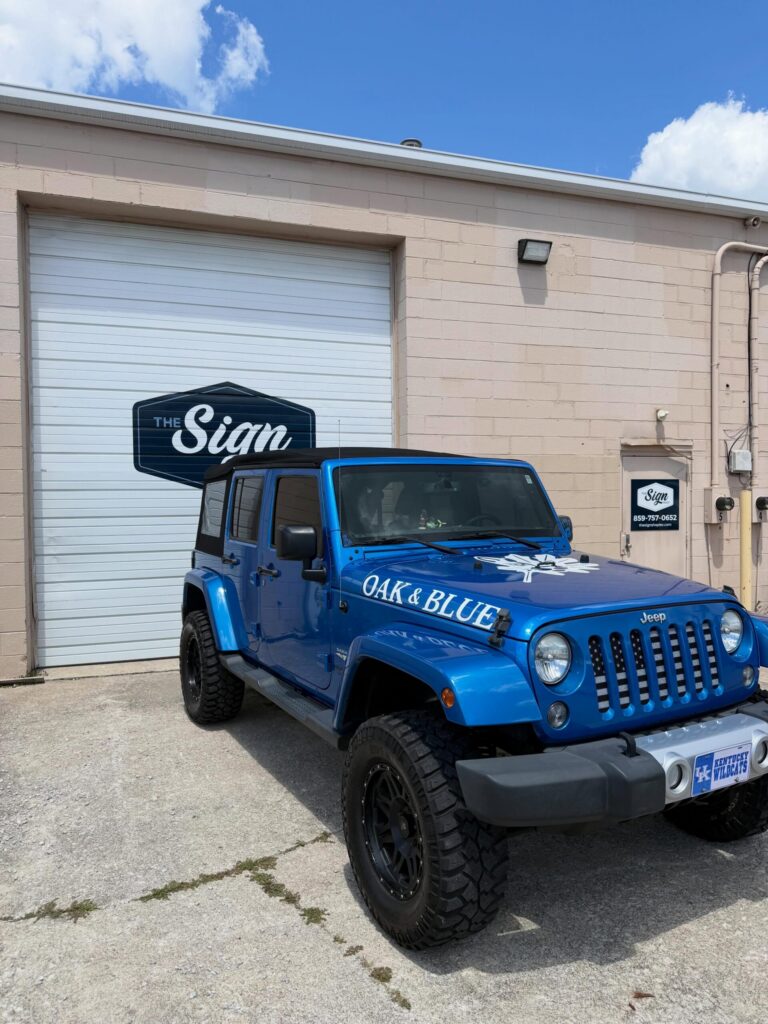 Custom partial Jeep wrap for Oak & Blue installed by The Sign Shop in Lexington Kentucky.