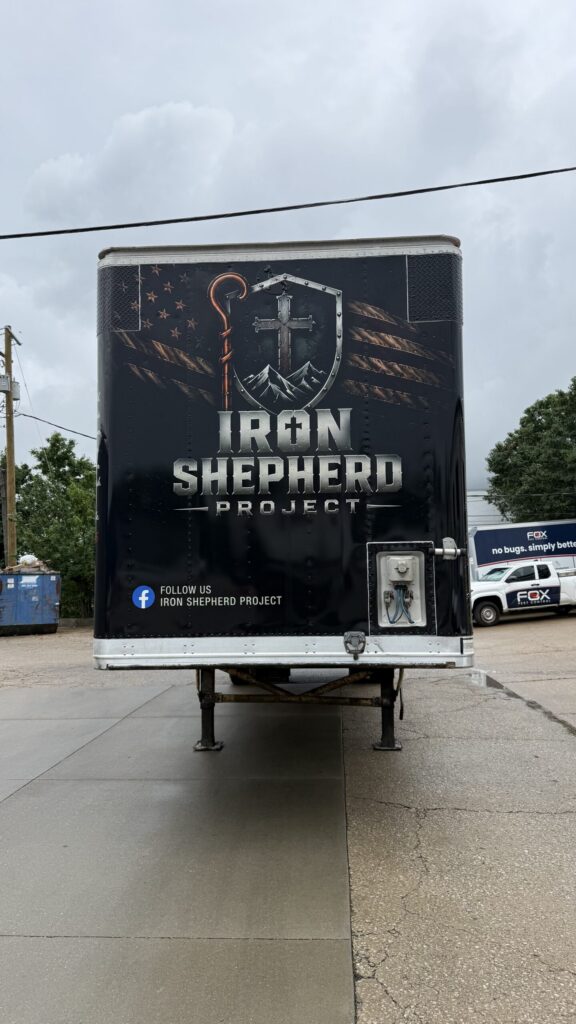 Rear view of semi trailer wrap by The Sign Shop.