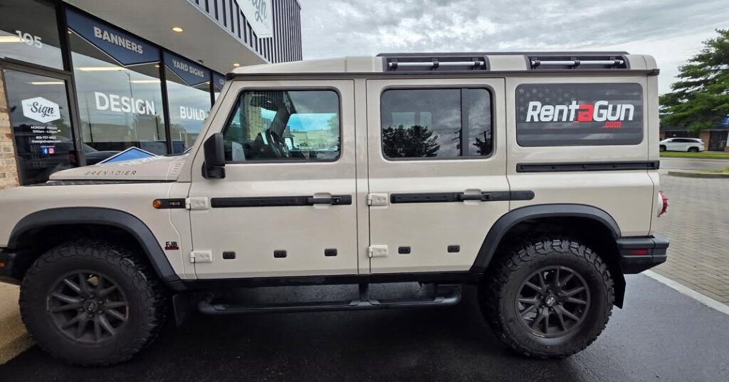 RentAGun.com vinyl logo graphic on rear vehicle window